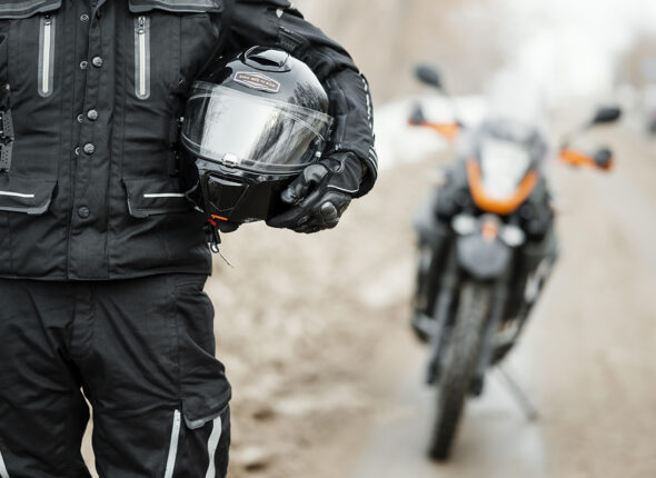 men-riding-motorcycle-winter-day
